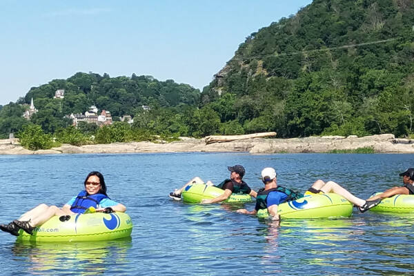 Group relaxing on tubes near Harper's Ferry - River & Trail Outfitters