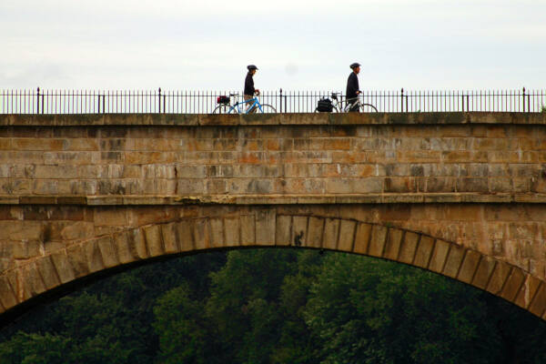 Bikers on the C&O Canal Aquaduct - River & Trail Outfitters