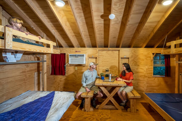Family inside rental cabin - River & Trail Outfitters