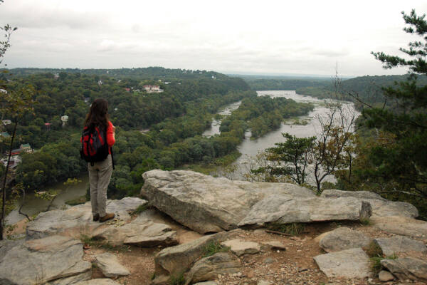 Woman at overlook on Maryland Heights Trail - River & Trail Outfitters