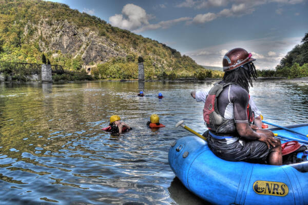 Rafters taking a swim near harpers ferry - River & Trail Outfitters