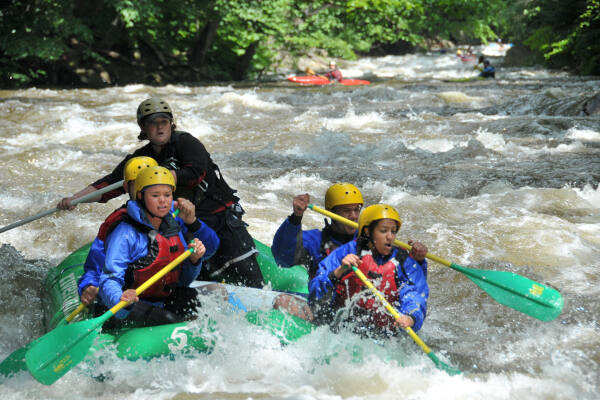 Raft hitting rapids on the Potomac - River and Trail Outfitter
