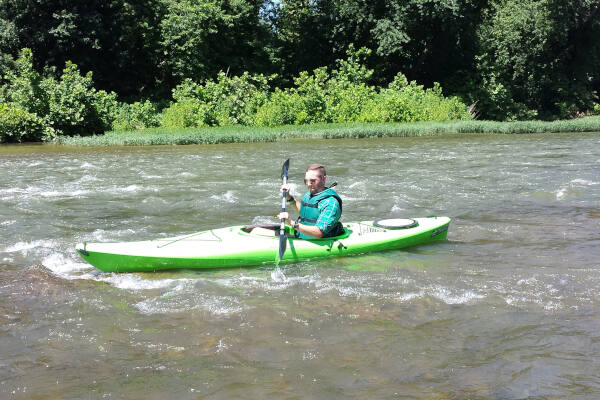 Kayak renter going down the Potomac - River & Trail Outfitters