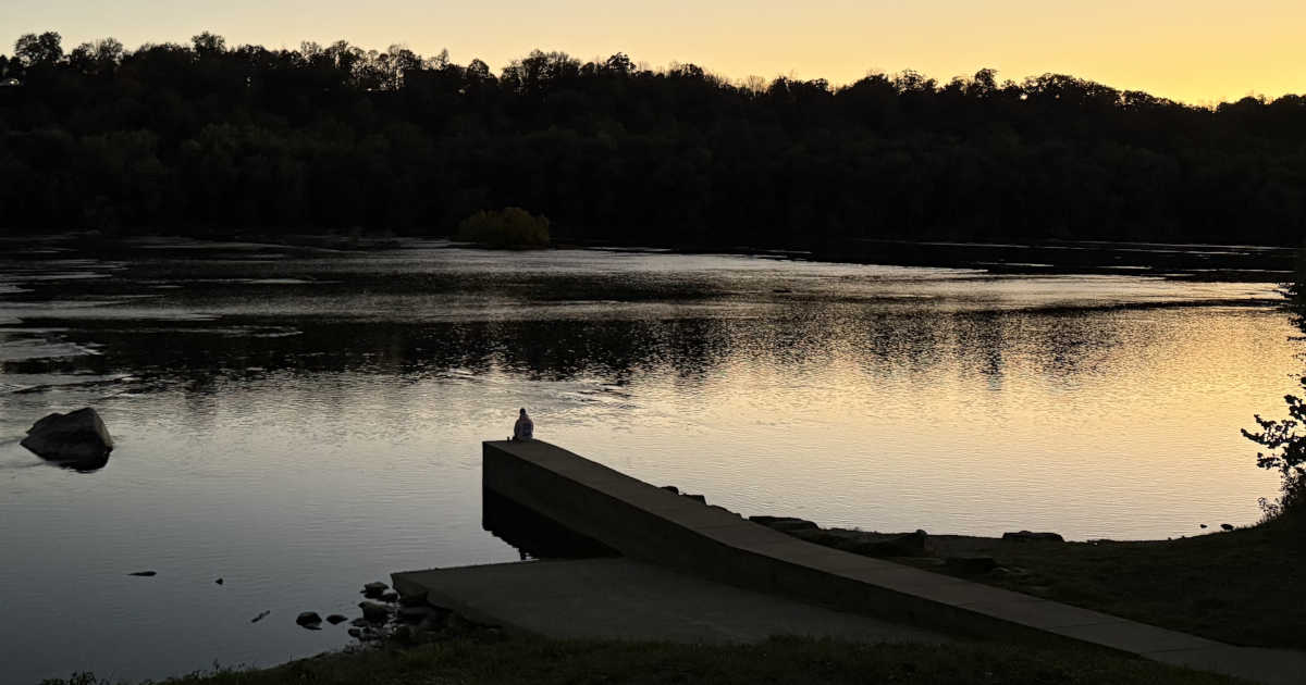 Man enjoying Potomac River at Brunswick Family Campground.
